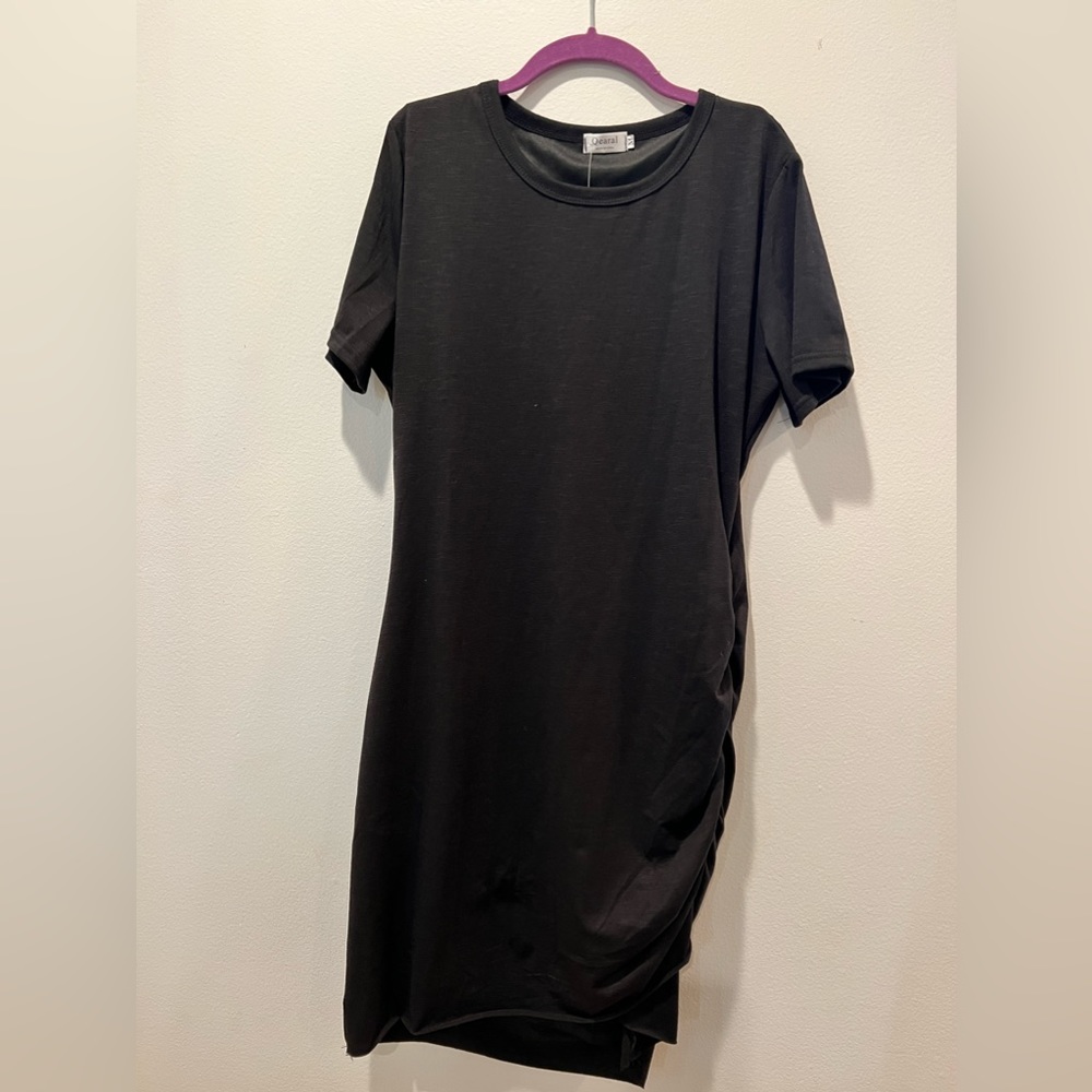 NWT black midi dress / Size Medium / cinch side . High low